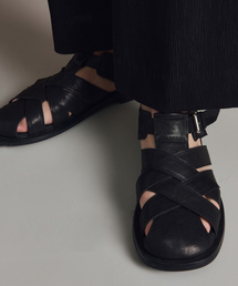 TNGT（ティーエヌジーティー）の「[TNGT x Mistake Project] Kinoshita Leather Fisherman sandals (Black) TNSO6E102BK（サンダル）」