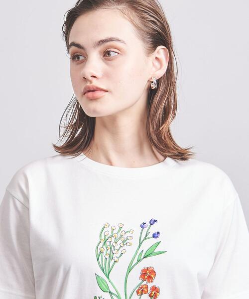 MUVEIL（ミュベール）の「【別注】＜MUVEIL（ミュベール）＞ フラワー Tシャツ-united LOVE project 2022†（Tシャツ/カットソー・レディース・ホワイト/ライラック・38）」の3枚目の写真