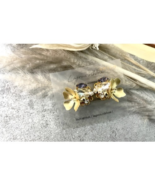 tone(トーン)の「【Lagrea ribbon】マットフラワーとパープルビジューのイヤリング(MA)(イヤリング・レディース・ゴールド系その他・FREE)」の1枚目の写真