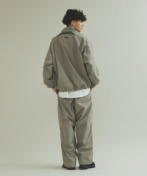 UMBRO(アンブロ)の「UMBRO / アンブロ 417別注 トラックパンツ(その他パンツ・メンズ・ベージュ/ネイビー・MEDIUM/LARGE/X-LARGE)」の15枚目の写真