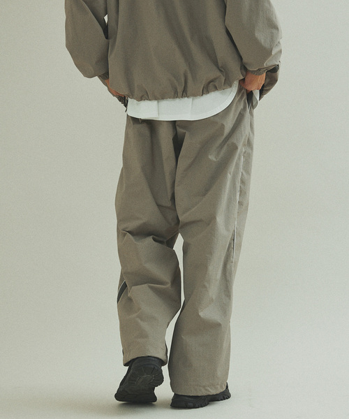 UMBRO(アンブロ)の「UMBRO / アンブロ 417別注 トラックパンツ(その他パンツ・メンズ・ベージュ/ネイビー・MEDIUM/LARGE/X-LARGE)」の21枚目の写真