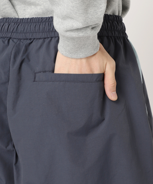 UMBRO(アンブロ)の「UMBRO / アンブロ 417別注 トラックパンツ(その他パンツ・メンズ・ベージュ/ネイビー・MEDIUM/LARGE/X-LARGE)」の7枚目の写真