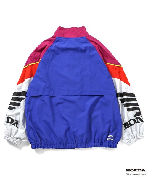 BREEZE(ブリーズ)の「【リンク】Honda 大人シャカシャカレーシングジャケット(ナイロンジャケット・メンズ・ブラック/レインボー・LARGE/MEDIUM)」の6枚目の写真