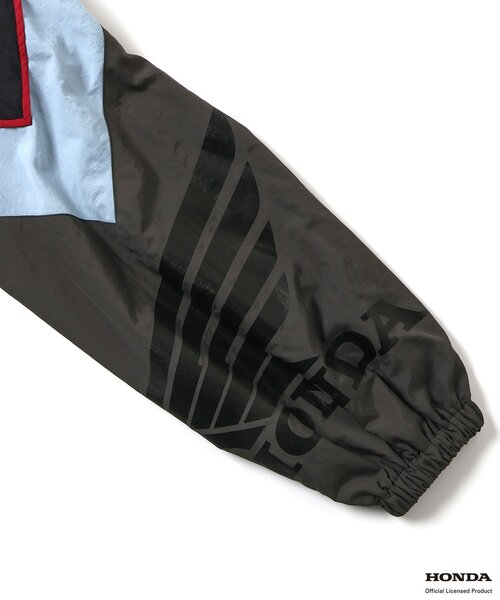 BREEZE(ブリーズ)の「【リンク】Honda 大人シャカシャカレーシングジャケット(ナイロンジャケット・メンズ・ブラック/レインボー・LARGE/MEDIUM)」の14枚目の写真