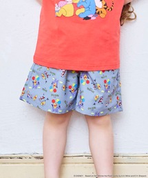 Disney（ディズニー）の「【別注】ディズニー総柄プリントハーフパンツ（その他パンツ）」