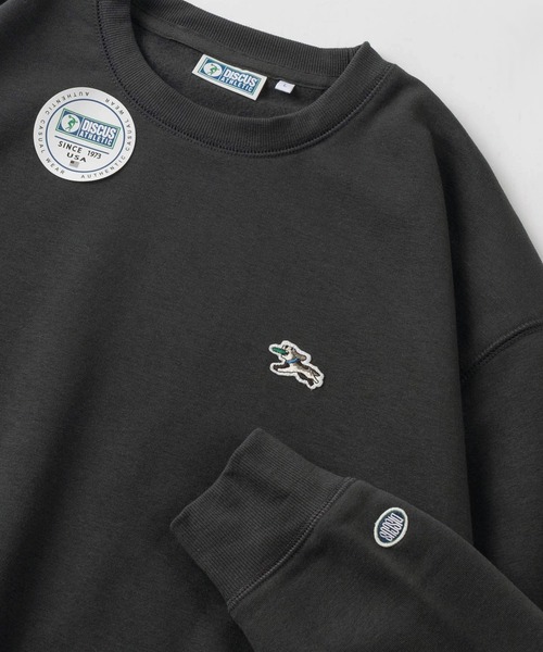 DISCUS ATHLETIC（ディスカス　アスレチック）の「【DISCUS/ディスカス】FLYING DISC DOG キャラクターイラスト ワンポイント刺繍＆ピスネームタグデザイン  クルーネックスウェット/裏起毛（スウェット・メンズ・オレンジ/オートミール/スミクロ/ブラック/サックスブルー・M/L/XL）」の2枚目の写真