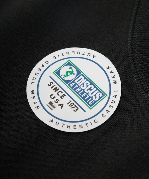 DISCUS ATHLETIC（ディスカス　アスレチック）の「【DISCUS/ディスカス】FLYING DISC DOG キャラクターイラスト ワンポイント刺繍＆ピスネームタグデザイン  クルーネックスウェット/裏起毛（スウェット・メンズ・オレンジ/オートミール/スミクロ/ブラック/サックスブルー・M/L/XL）」の9枚目の写真