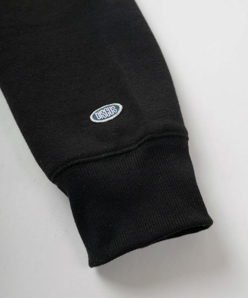 DISCUS ATHLETIC（ディスカス　アスレチック）の「【DISCUS/ディスカス】FLYING DISC DOG キャラクターイラスト ワンポイント刺繍＆ピスネームタグデザイン  クルーネックスウェット/裏起毛（スウェット・メンズ・オレンジ/オートミール/スミクロ/ブラック/サックスブルー・M/L/XL）」の15枚目の写真