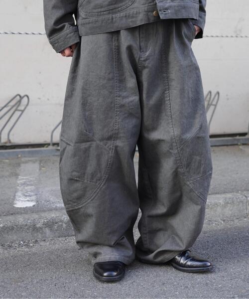 BEAVER(ビーバー)の「B omnivore/ビーオムニボー VINTAGE PANTS(チノパンツ・メンズ・ブラック/キャメル・M/L)」の1枚目の写真