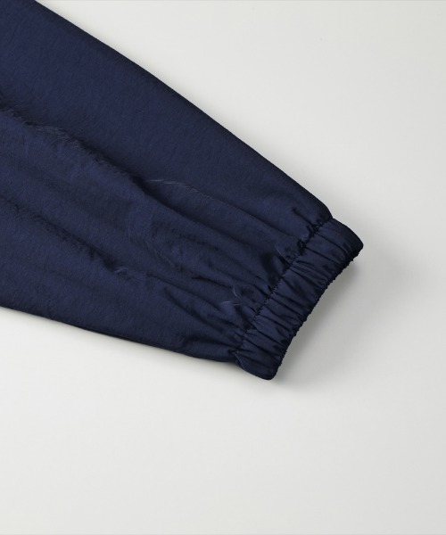 Ol' Basics(オールベーシックス)の「Ol' Basics(オール・ベーシックス) セットアップ対応 トラックジャケット U.S.ARMY ロゴプリント コットンライクナイロン 裏メッシュ トレーニングジャケット ナイロンジャケット ウインドブレーカー ライトアウター アメカジ ミリタリー メンズ レディース ユニセックス(ナイロンジャケット・メンズ・ネイビー/ブラック・L/XL/S/M)」の5枚目の写真