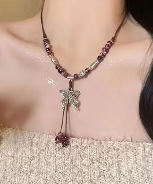 BARELY BLUE(ベアリーブルー)の「【 BARELY BLUE / ベアリーブルー 】 ヴィンテージ デザイン バタフライ ネックレス(ネックレス・レディース・ブラウン系/ホワイト系/グリーン系/ホワイト系1・FREE)」の1枚目の写真