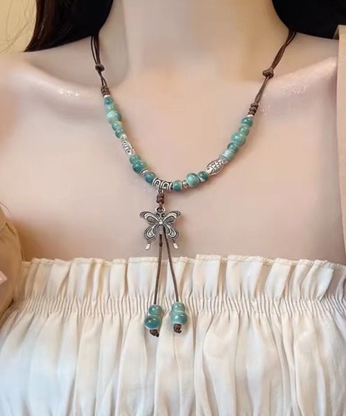 BARELY BLUE(ベアリーブルー)の「【 BARELY BLUE / ベアリーブルー 】 ヴィンテージ デザイン バタフライ ネックレス(ネックレス・レディース・ブラウン系/ホワイト系/グリーン系/ホワイト系1・FREE)」の5枚目の写真