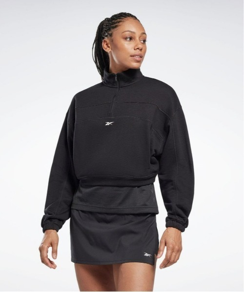 Reebok(リーボック)の「ワークアウト ニット 1/4 ジップ / WOR Knit 1/4 Zip(スウェット・レディース・ブラック/オレンジ・J/L/J/M/J/S/J/O/J/XS/X-LARGE/SMALL/X-SMALL/MEDIUM/LARGE)」の2枚目の写真