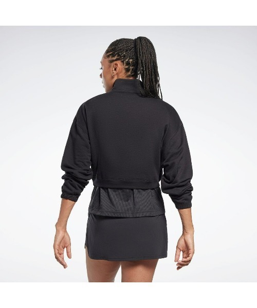 Reebok(リーボック)の「ワークアウト ニット 1/4 ジップ / WOR Knit 1/4 Zip(スウェット・レディース・ブラック/オレンジ・J/L/J/M/J/S/J/O/J/XS/X-LARGE/SMALL/X-SMALL/MEDIUM/LARGE)」の5枚目の写真