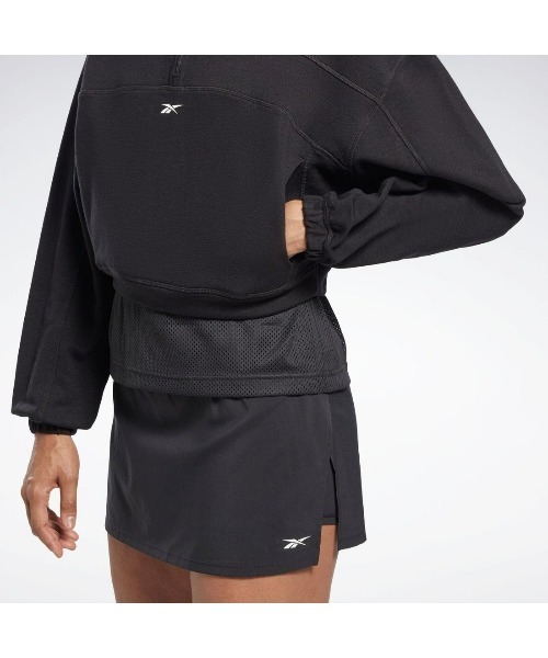 Reebok(リーボック)の「ワークアウト ニット 1/4 ジップ / WOR Knit 1/4 Zip(スウェット・レディース・ブラック/オレンジ・J/L/J/M/J/S/J/O/J/XS/X-LARGE/SMALL/X-SMALL/MEDIUM/LARGE)」の6枚目の写真