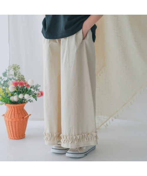 NHT(エヌエイチティー)の「エヌエイチティー フリルロングパンツ(その他パンツ・キッズ・ベージュ系その他6/インディゴブルー/ブラック・120cm/130cm/140cm/150cm/160cm/110cm)」の1枚目の写真