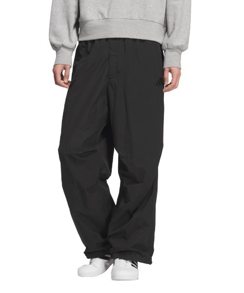 adidas(アディダス)の「【別注】アディダス adidas オーバーサイズフィット ウーブン フル レングス パラシュート パンツ ア 限定コラボ(その他パンツ・メンズ・ブラック/チャコールグレー/オリーブ・S/3L/LL/L/M)」の1枚目の写真