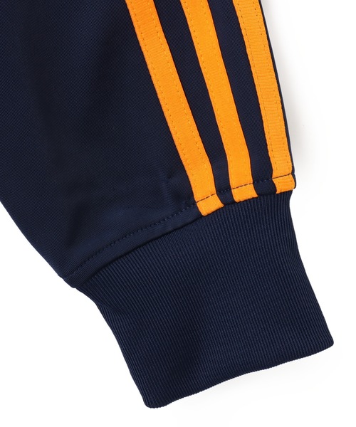 adidas(アディダス)の「adidas FBIRD LOOSE TT / アディダス ファイヤーバード ルーズ トラック トップ(ジャージ・レディース・インディゴブルー・L/M/S)」の5枚目の写真