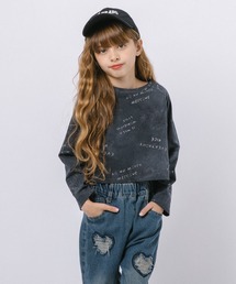 URBAN CHERRY（アーバンチェリー）の「【動くたびラメが煌めく】シルバーロゴラメニュアンストップス（Tシャツ/カットソー）」