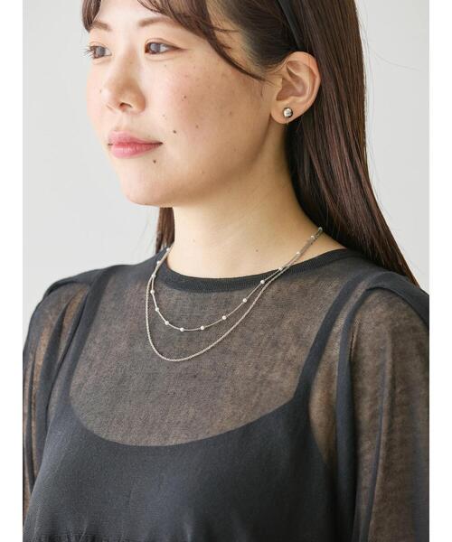 AMERICAN HOLIC（アメリカンホリック）の「【WEB限定・小柄女性向け】ボリュームスリーブティアードニットチュニック（チュニック・レディース・ブラック/オフホワイト・XS）」の11枚目の写真