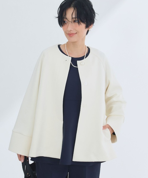 CROSS FUNCTION(クロスファンクション)の「正解 パールボタンAラインコート【CROSS FUNCTION/クロスファンクション】(ノーカラーコート・レディース・アイボリー/ネイビー・LL/L/M)」の2枚目の写真
