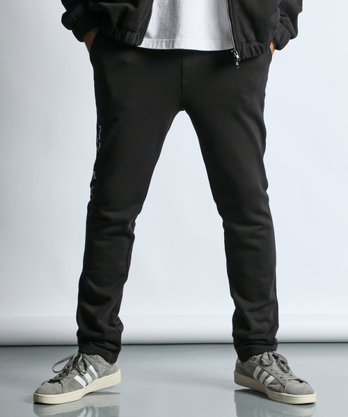 The DUFFER of ST.GEORGE(ザダファーオブセントジョージ)の「【WEB限定アイテム】〔BLACK LABEL〕"A-PACK" SETUP SWEAT PANTS:セットアップ スウェットパンツ/丈長め(スウェットパンツ・メンズ・ブラック・X-LARGE/LARGE/MEDIUM/SMALL)」の1枚目の写真