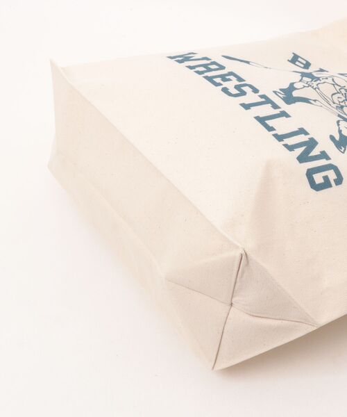 Ol' Basics(オールベーシックス)の「Ol' Basics(オール・ベーシックス) トートバッグ キャンバス レスリングイラスト カレッジロゴ プリント 鞄 BAG アメカジ メンズ レディース ユニセックス Mサイズ(トートバッグ・レディース・ナチュラル・FREE)」の4枚目の写真