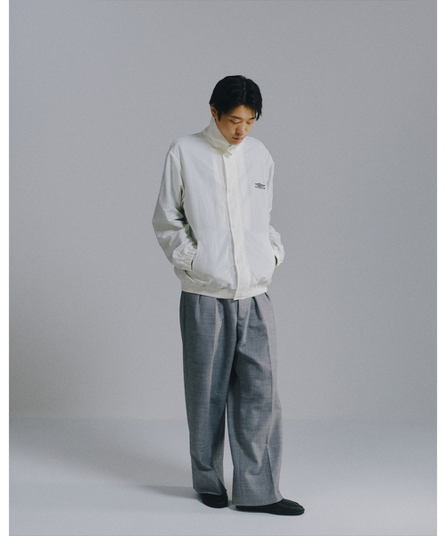 ジャケット・アウター UMBRO EX WARM UP PISTE JACKET UMBRO（アンブロ）の「UMBRO EX WARM UP PISTE JACKET（ナイロン
