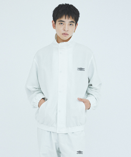 ジャケット・アウター UMBRO EX WARM UP PISTE JACKET UMBRO（アンブロ）の「UMBRO EX WARM UP PISTE JACKET（ナイロン