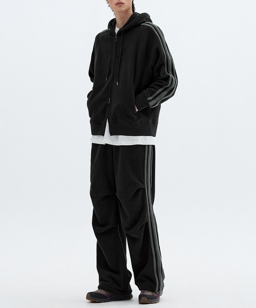 ALAND(エーランド)の「セットアップ可【UNISEX】Filluminate/トラックフリースパンツ(スウェットパンツ・レディース・ブラック/アイボリー・SMALL/MEDIUM)」の8枚目の写真