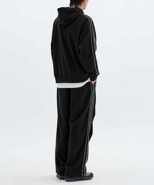 ALAND(エーランド)の「セットアップ可【UNISEX】Filluminate/トラックフリースパンツ(スウェットパンツ・レディース・ブラック/アイボリー・SMALL/MEDIUM)」の9枚目の写真