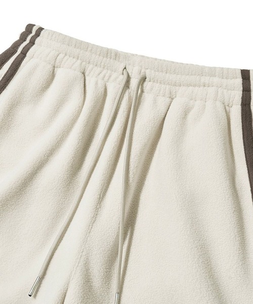 ALAND(エーランド)の「セットアップ可【UNISEX】Filluminate/トラックフリースパンツ(スウェットパンツ・レディース・ブラック/アイボリー・SMALL/MEDIUM)」の20枚目の写真