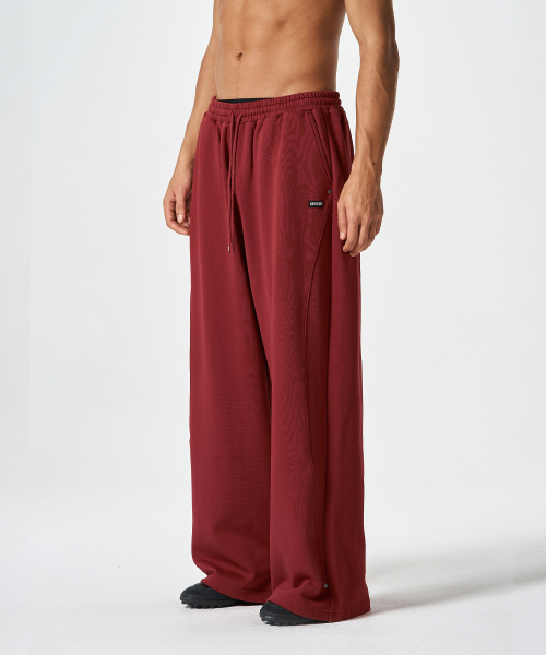 カーブリベットスウェットパンツ（チェリーレッド）