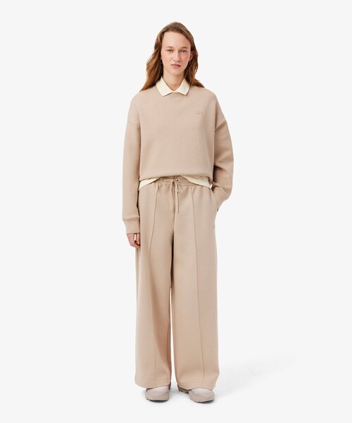 LACOSTE（ラコステ）の「ワイドレッグ スムーススウェットトラックパンツ / プリーツワイドパンツ（スウェットパンツ・レディース・ホワイト/ベージュ・40/38/34/36）」の3枚目の写真