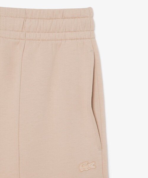 LACOSTE（ラコステ）の「ワイドレッグ スムーススウェットトラックパンツ / プリーツワイドパンツ（スウェットパンツ・レディース・ホワイト/ベージュ・40/38/34/36）」の7枚目の写真