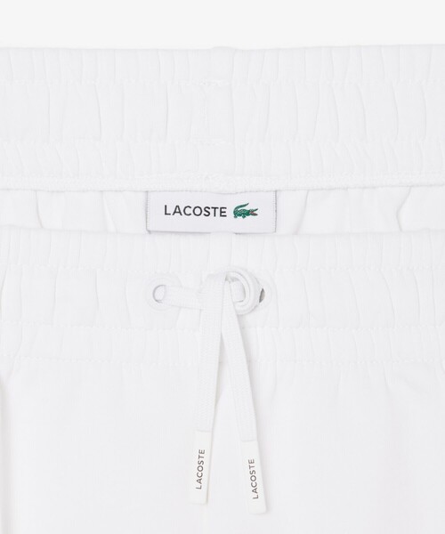 LACOSTE（ラコステ）の「ワイドレッグ スムーススウェットトラックパンツ / プリーツワイドパンツ（スウェットパンツ・レディース・ホワイト/ベージュ・40/38/34/36）」の16枚目の写真