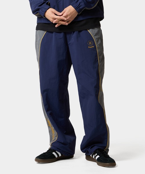 HUF(ハフ)の「ANTHEM TRACK PANT(その他パンツ・メンズ・ブラック/ネイビー・M/L/S)」の1枚目の写真
