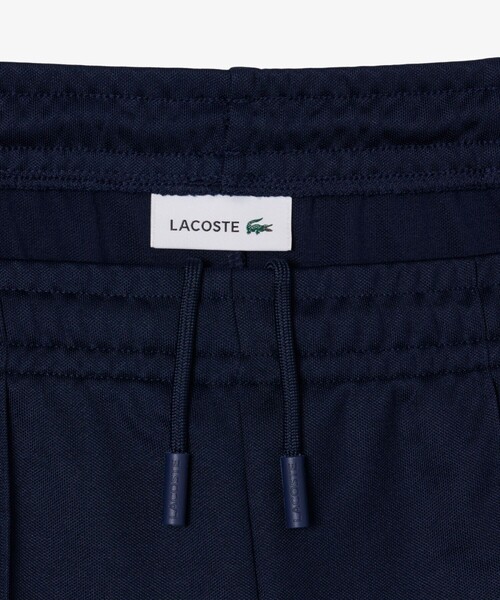LACOSTE(ラコステ)の「鹿の子ジャージフレアトラックパンツ(スウェットパンツ・レディース・ブラウン・36/38)」の6枚目の写真