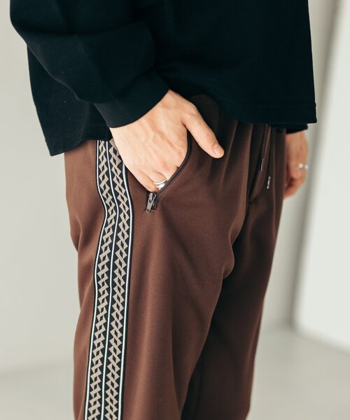 JOURNAL STANDARD（ジャーナルスタンダード）の「トライバルパターン トラックパンツ（その他パンツ・メンズ・ブラック/ブラウン/ネイビー・MEDIUM/LARGE）」の9枚目の写真