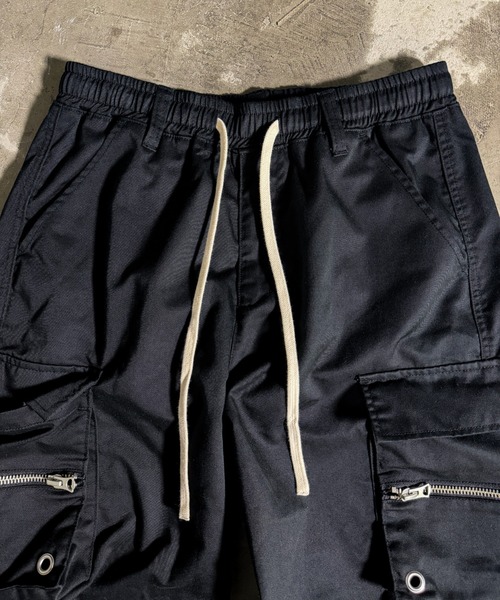 A‘gem 9（エージェムナイン）の「A'GEM/9 × .kom 『A'GEM/9/エージェムナイン』 ワイドカーゴドロストパンツ（カーゴパンツ・メンズ・ブラック・FREE）」の3枚目の写真
