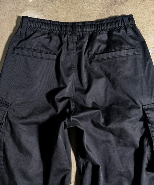 A‘gem 9（エージェムナイン）の「A'GEM/9 × .kom 『A'GEM/9/エージェムナイン』 ワイドカーゴドロストパンツ（カーゴパンツ・メンズ・ブラック・FREE）」の6枚目の写真