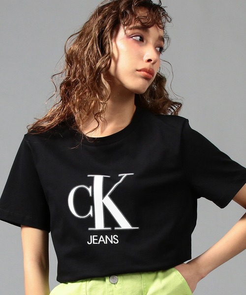 Calvin Klein Jeans(カルヴァンクラインジーンズ)の「ネオン ロゴ ショートスリーブ Tシャツ(Tシャツ/カットソー・レディース・ホワイト/ブラック・M/S/L/XS)」の1枚目の写真