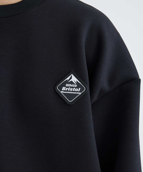 F.C.Real Bristol(エフシーレアルブリストル)の「WM × F.C.Real Bristol SWEAT PULLOVER(スウェット・メンズ・ブラック・1/0)」の2枚目の写真