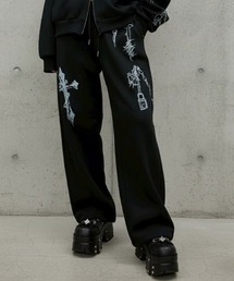 ARULE（アルール）の「A'GEM/9 × .kom 『ARULE/アルール』Chain Cross Graphic Sweatpants /チェーンクロスグラフィックスエットパンツ（スウェットパンツ）」