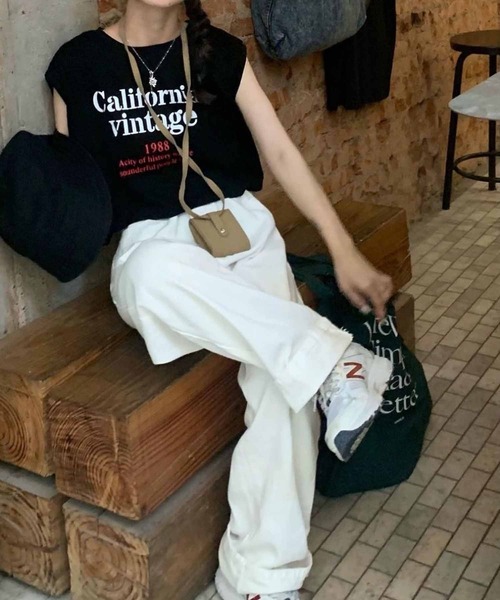NANEA（ナネア）の「クロップド丈ロゴプリントノースリーブカットソー（Tシャツ/カットソー・レディース・オレンジ/ホワイト/ブラック・SMALL/MEDIUM/LARGE）」の5枚目の写真
