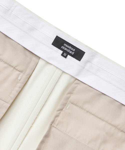 MUSINSA STANDARD（ムシンサスタンダード）の「テーパードヒドゥンバンディング10スラックス[クリーム]（スラックス・メンズ・その他・27/28/29/34/32/30/31/33/26/40/38/42/36）」の9枚目の写真