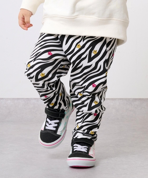 X-girl Stages(エックスガールステージス)の「総柄テーパードレギンス(レギンス/スパッツ・キッズ・オフホワイト/ベージュ・120cm/100cm/110cm/80cm/90cm)」の1枚目の写真