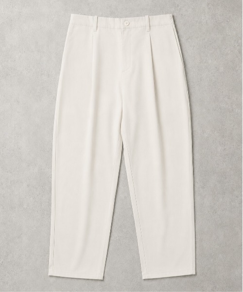 UNIVERSAL OVERALL(ユニバーサルオーバーオール)の「【RES】【UNIVERSAL OVERALL】T/C TUCK TAPERED(チノパンツ・メンズ・ブラック/アイボリー・32inch/34inch/36inch/30inch)」の1枚目の写真