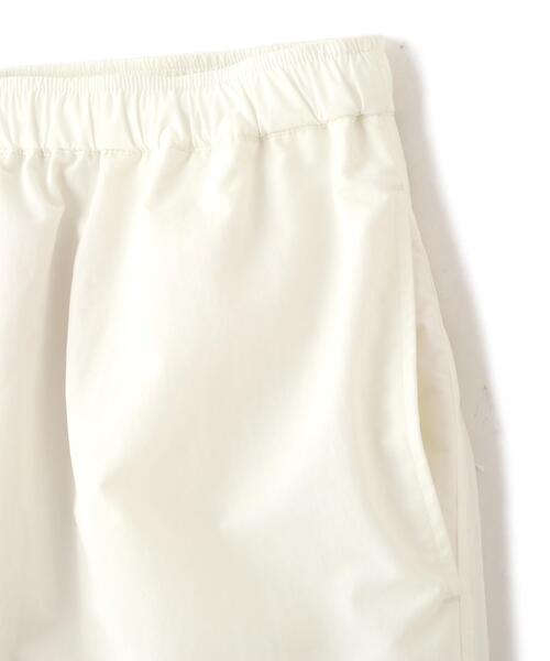 Y(ワイ)の「Y / RECYCLE NYLON MIX TAFFETA / RECYCLE POLYESTER FLEECE TROUSERS(その他パンツ・メンズ・ネイビー/ホワイト・LARGE/MEDIUM/SMALL)」の11枚目の写真