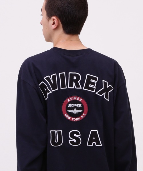 AVIREX(アヴィレックス)の「VARSITY LOGO L/S T-SHIRT / バーシティ ロゴ 長袖Tシャツ / AVIREX / アヴィレックス(Tシャツ/カットソー・メンズ・オレンジ/ネイビー/ブラック/オフホワイト・MEDIUM/LARGE/X-LARGE/XX-LARGE)」の3枚目の写真